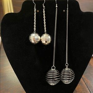 2 Pair of Silver Tone Dangle Earrings.